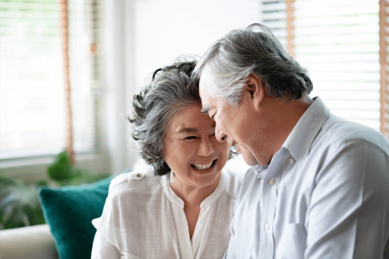 Woman and man smiling at each other